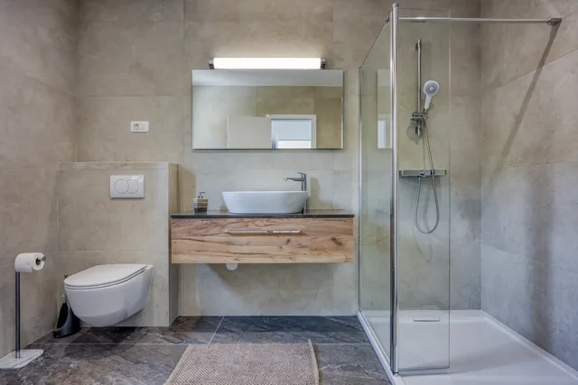 Bathroom with a walk-in shower in neutral tones