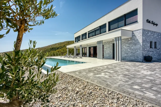Contemporary façade of Villa Stefanija beside the pool