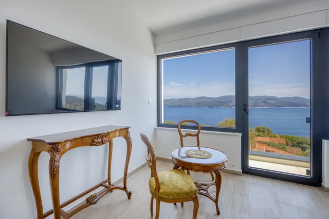 Window-side corner overlooking the sea