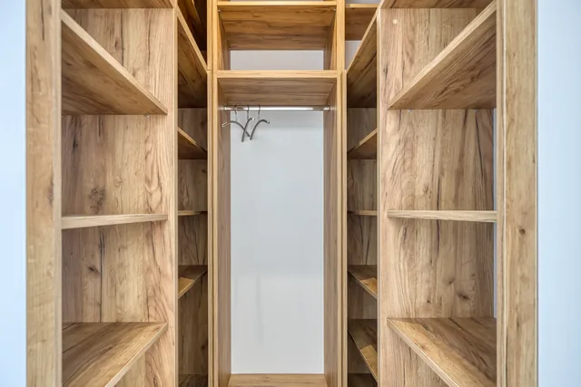 Wooden dressing area in a bedroom