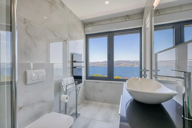 Bathroom window overlooking the sea